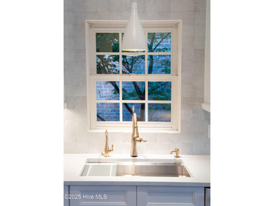 Perfectly positioned near Landfall's Eastwood Road entrance on Country Club of Landfall in North Carolina - for sale on GolfHomes.com, golf home, golf lot