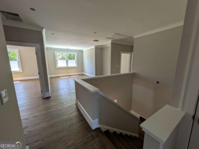 A golfer's paradise! This 4-bedroom, 3-bathroom home with 9' on Indian Creek Golf Club in Georgia - for sale on GolfHomes.com, golf home, golf lot