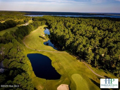 Beautiful Live Oak trees adorn this large corner lot in on Harbour Point Golf Club in North Carolina - for sale on GolfHomes.com, golf home, golf lot