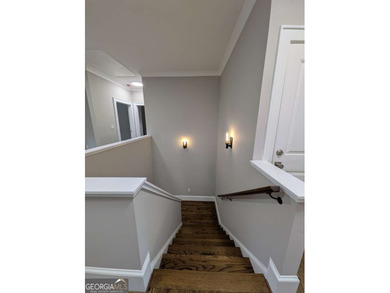 A golfer's paradise! This 4-bedroom, 3-bathroom home with 9' on Indian Creek Golf Club in Georgia - for sale on GolfHomes.com, golf home, golf lot