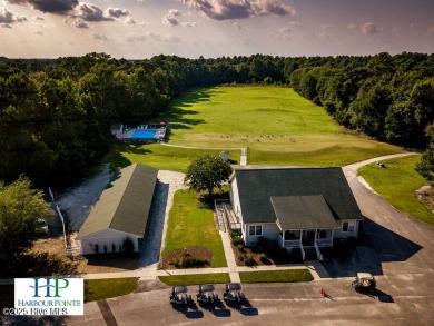 Beautiful Live Oak trees adorn this large corner lot in on Harbour Point Golf Club in North Carolina - for sale on GolfHomes.com, golf home, golf lot