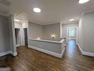 A golfer's paradise! This 4-bedroom, 3-bathroom home with 9' on Indian Creek Golf Club in Georgia - for sale on GolfHomes.com, golf home, golf lot