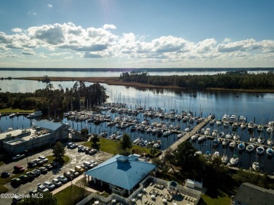 Beautiful Live Oak trees adorn this large corner lot in on Harbour Point Golf Club in North Carolina - for sale on GolfHomes.com, golf home, golf lot
