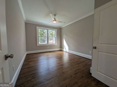 A golfer's paradise! This 4-bedroom, 3-bathroom home with 9' on Indian Creek Golf Club in Georgia - for sale on GolfHomes.com, golf home, golf lot