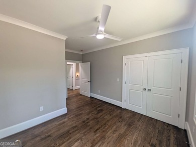 A golfer's paradise! This 4-bedroom, 3-bathroom home with 9' on Indian Creek Golf Club in Georgia - for sale on GolfHomes.com, golf home, golf lot