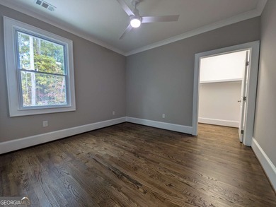 A golfer's paradise! This 4-bedroom, 3-bathroom home with 9' on Indian Creek Golf Club in Georgia - for sale on GolfHomes.com, golf home, golf lot