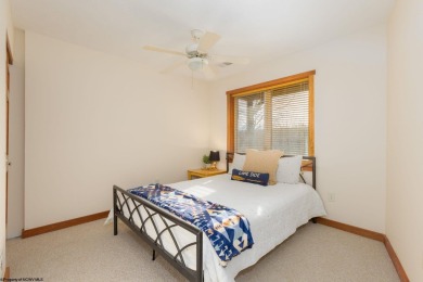 Welcome to 'Tranquil Peaks', a stunning Postmodern Chalet on Alpine Lake Resort in West Virginia - for sale on GolfHomes.com, golf home, golf lot