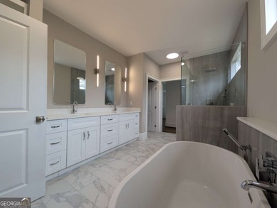 A golfer's paradise! This 4-bedroom, 3-bathroom home with 9' on Indian Creek Golf Club in Georgia - for sale on GolfHomes.com, golf home, golf lot