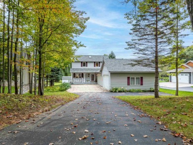 Waterfront Retreat on Lake Lancer in Sugar Springs, Gladwin, MI on Lakeside Golf Course in Michigan - for sale on GolfHomes.com, golf home, golf lot
