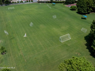 Perfectly positioned near Landfall's Eastwood Road entrance on Country Club of Landfall in North Carolina - for sale on GolfHomes.com, golf home, golf lot