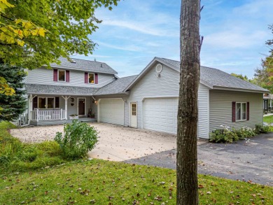 Waterfront Retreat on Lake Lancer in Sugar Springs, Gladwin, MI on Lakeside Golf Course in Michigan - for sale on GolfHomes.com, golf home, golf lot
