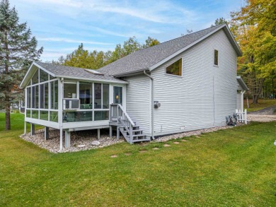 Waterfront Retreat on Lake Lancer in Sugar Springs, Gladwin, MI on Lakeside Golf Course in Michigan - for sale on GolfHomes.com, golf home, golf lot