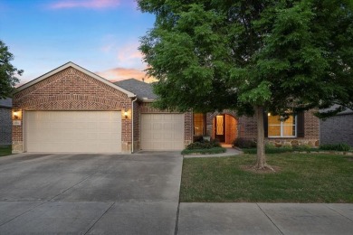 A true masterpiece! This exquisite home is a haven, boasting on Frisco Lakes Golf Course in Texas - for sale on GolfHomes.com, golf home, golf lot