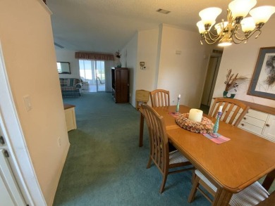 This well cared for home is furnished and includes the golf cart on Lake Fairways Country Club in Florida - for sale on GolfHomes.com, golf home, golf lot