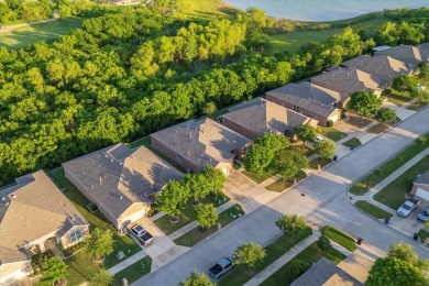 A true masterpiece! This exquisite home is a haven, boasting on Frisco Lakes Golf Course in Texas - for sale on GolfHomes.com, golf home, golf lot