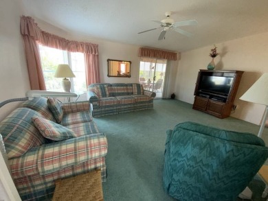 This well cared for home is furnished and includes the golf cart on Lake Fairways Country Club in Florida - for sale on GolfHomes.com, golf home, golf lot