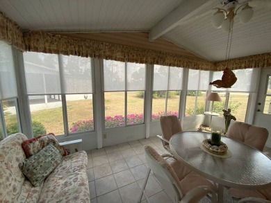 This well cared for home is furnished and includes the golf cart on Lake Fairways Country Club in Florida - for sale on GolfHomes.com, golf home, golf lot