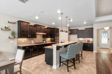 A true masterpiece! This exquisite home is a haven, boasting on Frisco Lakes Golf Course in Texas - for sale on GolfHomes.com, golf home, golf lot