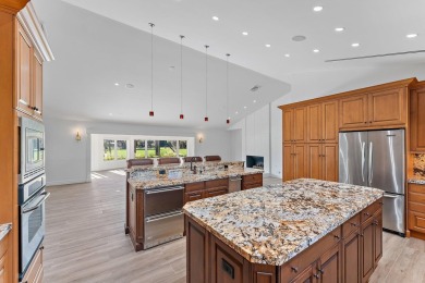 This beautifully designed home is a dream come true for those on Tequesta Country Club in Florida - for sale on GolfHomes.com, golf home, golf lot