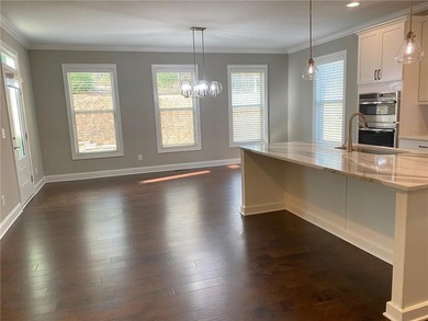 Gorgeous three-sided brick home with an open floor plan and on Woodmont Golf and Country Club in Georgia - for sale on GolfHomes.com, golf home, golf lot