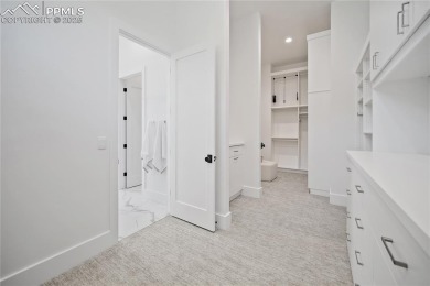 Welcome to your dream home in the prestigious gated village of on The Club At Flying Horse in Colorado - for sale on GolfHomes.com, golf home, golf lot