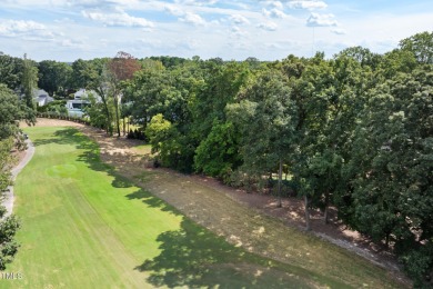 Tear down opportunity in one of the most coveted golf course on MacGregor Downs Country Club in North Carolina - for sale on GolfHomes.com, golf home, golf lot