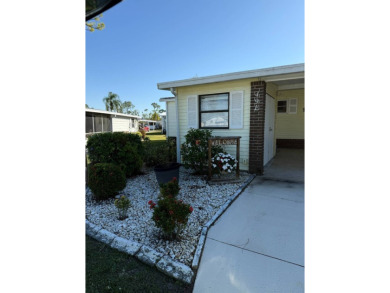 This lovely, manufactured home is in Lake Fairways Country Club on Pine Lakes Country Club in Florida - for sale on GolfHomes.com, golf home, golf lot