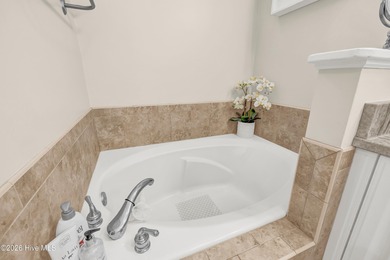 An all brick unique Gem! One-level living in gorgeous gated golf on Porters Neck Country Club in North Carolina - for sale on GolfHomes.com, golf home, golf lot