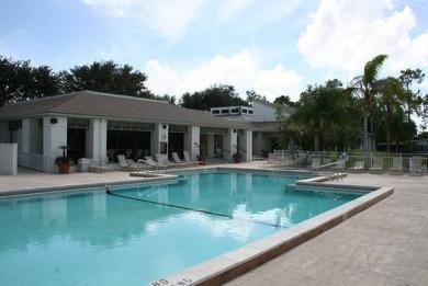 This lovely, manufactured home is in Lake Fairways Country Club on Pine Lakes Country Club in Florida - for sale on GolfHomes.com, golf home, golf lot