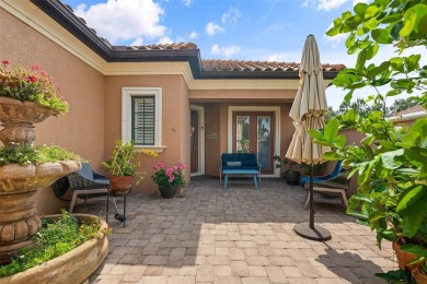 SPECTACULAR AND METICULOUSLY MAINTAINED THREE BEDROOM, DEN, 3 on Esplanade Golf and Country at Lakewood Ranch in Florida - for sale on GolfHomes.com, golf home, golf lot