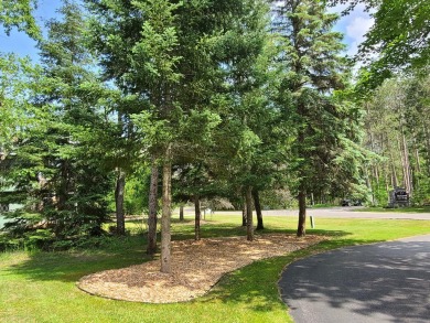 In Beautiful Michaywe find this well maintained 3BR 3BTH on Michaywe Pines Course in Michigan - for sale on GolfHomes.com, golf home, golf lot