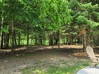 In Beautiful Michaywe find this well maintained 3BR 3BTH on Michaywe Pines Course in Michigan - for sale on GolfHomes.com, golf home, golf lot