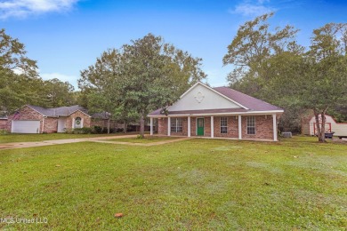 This charming 3-bedroom, 2-bathroom home is a perfect starter on Mississippi National Golf Course in Mississippi - for sale on GolfHomes.com, golf home, golf lot