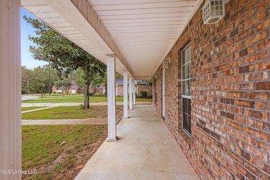 This charming 3-bedroom, 2-bathroom home is a perfect starter on Mississippi National Golf Course in Mississippi - for sale on GolfHomes.com, golf home, golf lot