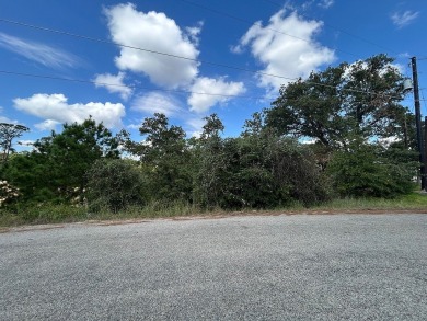 Nestled within the serene beauty of Tahitian Village, this on Pine Forest Golf Club in Texas - for sale on GolfHomes.com, golf home, golf lot