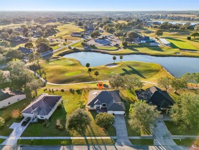 Enjoy the evening sunsets and beautiful water views from your on Black Bear Golf Club in Florida - for sale on GolfHomes.com, golf home, golf lot