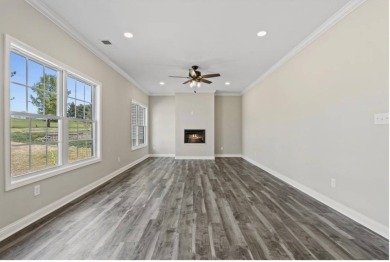 This 4-bedroom, 3.5-bath home offers stunning golf course views on Canewood Golf Course in Kentucky - for sale on GolfHomes.com, golf home, golf lot