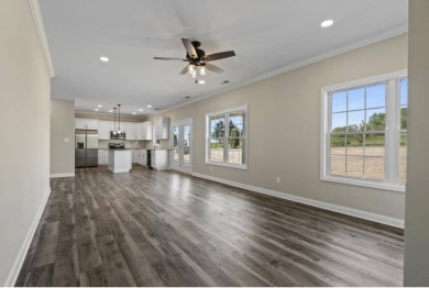 This 4-bedroom, 3.5-bath home offers stunning golf course views on Canewood Golf Course in Kentucky - for sale on GolfHomes.com, golf home, golf lot
