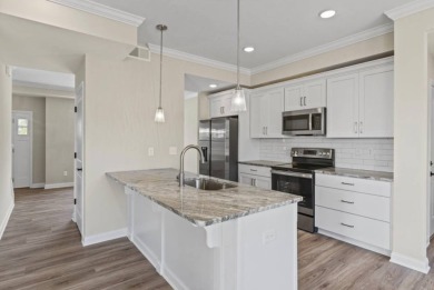 This 4-bedroom, 3.5-bath home offers stunning golf course views on Canewood Golf Course in Kentucky - for sale on GolfHomes.com, golf home, golf lot