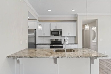 This 4-bedroom, 3.5-bath home offers stunning golf course views on Canewood Golf Course in Kentucky - for sale on GolfHomes.com, golf home, golf lot