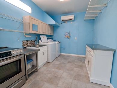 This newly renovated Executive Suite is approximately 1,190 sq on The Great Outdoors Golf and Country Club in Florida - for sale on GolfHomes.com, golf home, golf lot