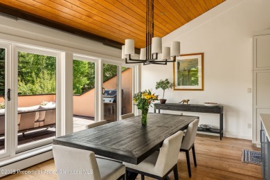 A beautifully renovated corner townhome, just a short stroll on The Snowmass Club in Colorado - for sale on GolfHomes.com, golf home, golf lot