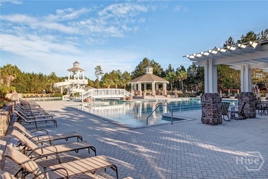Discover a rare opportunity to own 121 feet of peaceful lagoon on Savannah Quarters Country Club in Georgia - for sale on GolfHomes.com, golf home, golf lot