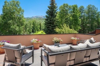 A beautifully renovated corner townhome, just a short stroll on The Snowmass Club in Colorado - for sale on GolfHomes.com, golf home, golf lot