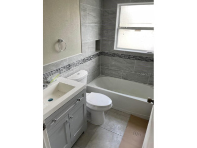 This beautifully updated 2-bedroom, 2-bath condo in Silver on Country Club At Silver Springs Shores in Florida - for sale on GolfHomes.com, golf home, golf lot