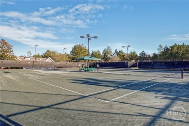 Discover a rare opportunity to own 121 feet of peaceful lagoon on Savannah Quarters Country Club in Georgia - for sale on GolfHomes.com, golf home, golf lot