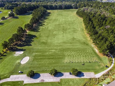 Discover a rare opportunity to own 121 feet of peaceful lagoon on Savannah Quarters Country Club in Georgia - for sale on GolfHomes.com, golf home, golf lot