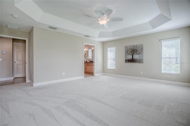 Welcome to Your Dream Retreat with this Aspen designer model on Egret Championship Golf Course in Florida - for sale on GolfHomes.com, golf home, golf lot
