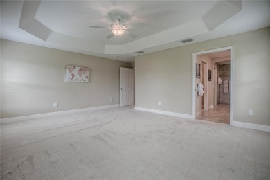 Welcome to Your Dream Retreat with this Aspen designer model on Egret Championship Golf Course in Florida - for sale on GolfHomes.com, golf home, golf lot