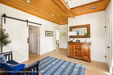 A beautifully renovated corner townhome, just a short stroll on The Snowmass Club in Colorado - for sale on GolfHomes.com, golf home, golf lot